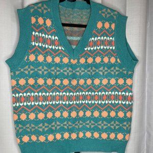 Oversized turquoise knit vest